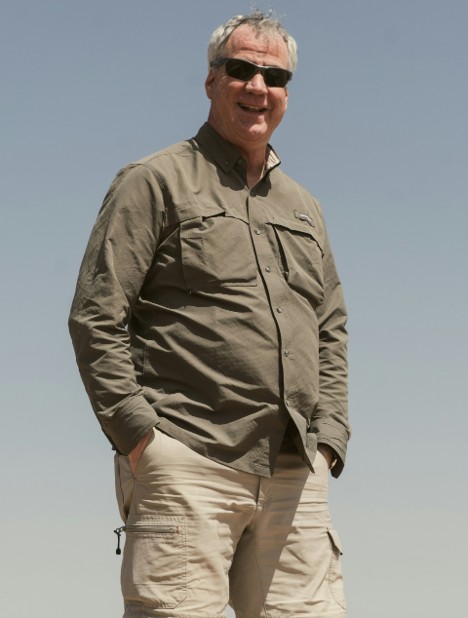 Traveller wearing a lightweight safari shirt for exploring the African savannah